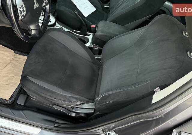 Серый Мицубиси Аутлендер, объемом двигателя 2.4 л и пробегом 174 тыс. км за 9599 $, фото 14 на Automoto.ua