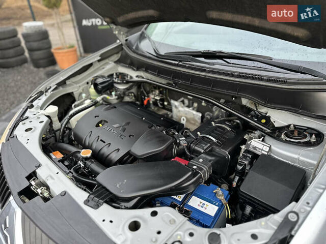 Серый Мицубиси Аутлендер, объемом двигателя 2.4 л и пробегом 61 тыс. км за 11300 $, фото 60 на Automoto.ua