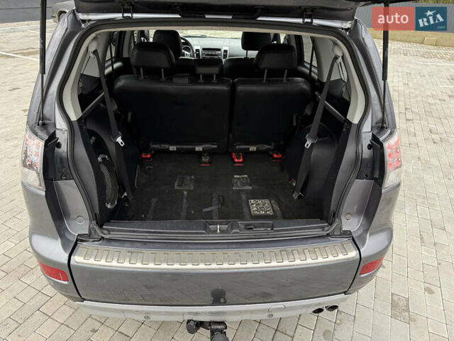 Сірий Міцубісі Аутлендер, об'ємом двигуна 2 л та пробігом 237 тис. км за 8999 $, фото 51 на Automoto.ua