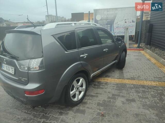 Серый Мицубиси Аутлендер, объемом двигателя 2.4 л и пробегом 290 тыс. км за 8000 $, фото 4 на Automoto.ua