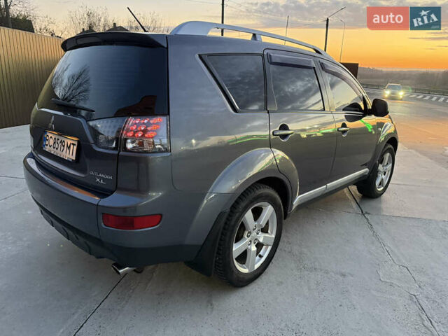 Серый Мицубиси Аутлендер, объемом двигателя 2.4 л и пробегом 210 тыс. км за 8300 $, фото 17 на Automoto.ua