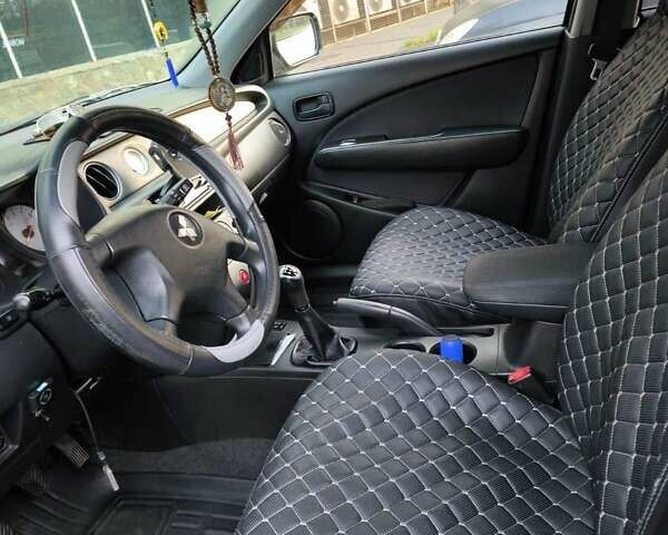 Сірий Міцубісі Аутлендер, об'ємом двигуна 2 л та пробігом 161 тис. км за 7500 $, фото 38 на Automoto.ua