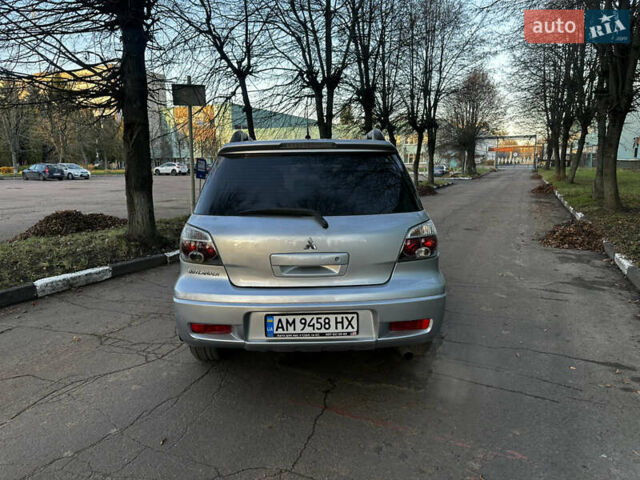 Серый Мицубиси Аутлендер, объемом двигателя 2.4 л и пробегом 320 тыс. км за 6000 $, фото 11 на Automoto.ua
