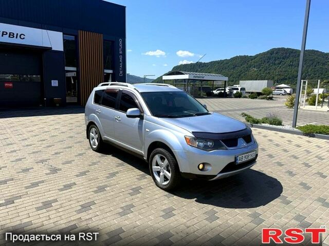 Сірий Міцубісі Аутлендер, об'ємом двигуна 2.4 л та пробігом 300 тис. км за 6900 $, фото 1 на Automoto.ua