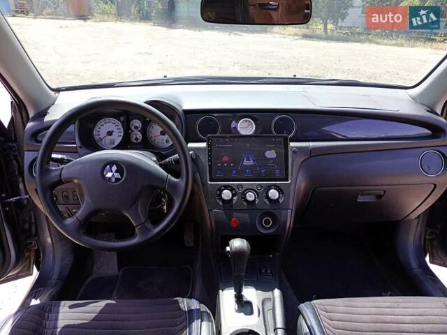 Серый Мицубиси Аутлендер, объемом двигателя 2.35 л и пробегом 342 тыс. км за 6900 $, фото 16 на Automoto.ua