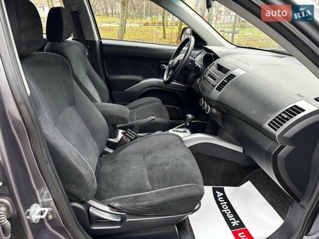 Серый Мицубиси Аутлендер, объемом двигателя 2.4 л и пробегом 237 тыс. км за 8490 $, фото 16 на Automoto.ua