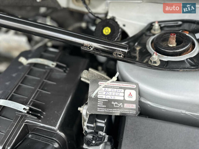 Серый Мицубиси Аутлендер, объемом двигателя 2.4 л и пробегом 61 тыс. км за 11300 $, фото 61 на Automoto.ua