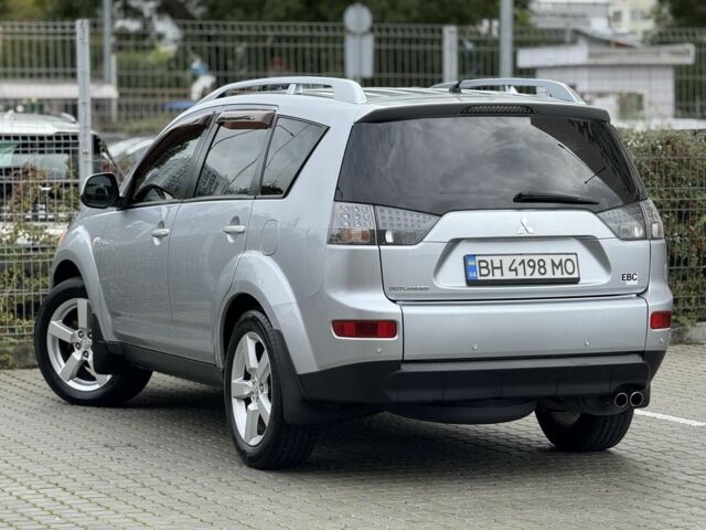 Серый Мицубиси Аутлендер, объемом двигателя 3 л и пробегом 175 тыс. км за 8500 $, фото 5 на Automoto.ua