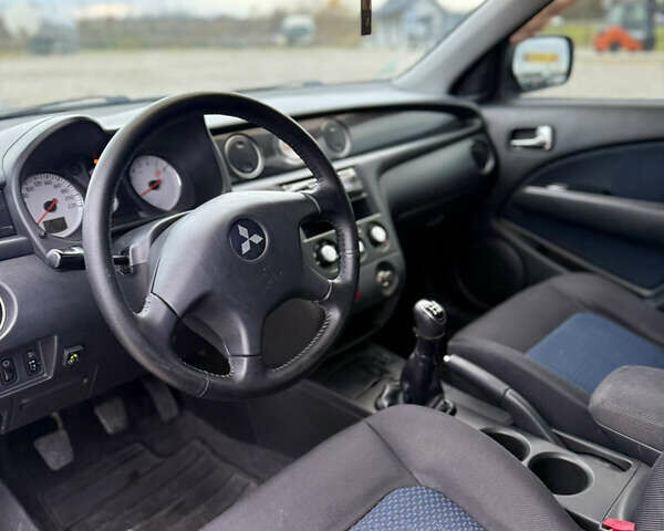 Серый Мицубиси Аутлендер, объемом двигателя 2 л и пробегом 199 тыс. км за 5999 $, фото 15 на Automoto.ua