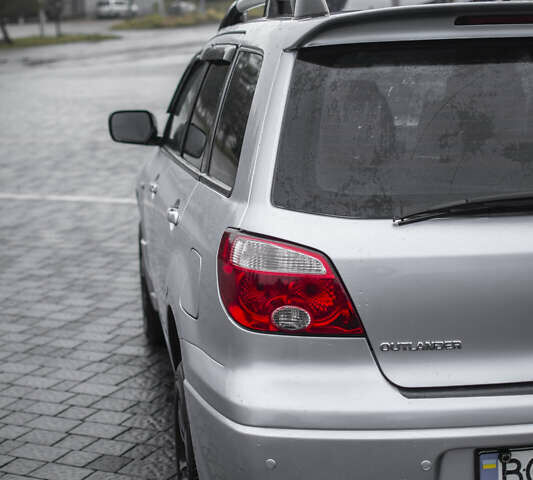 Сірий Міцубісі Аутлендер, об'ємом двигуна 2 л та пробігом 258 тис. км за 5650 $, фото 8 на Automoto.ua