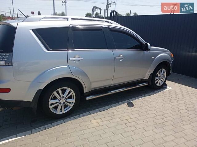 Сірий Міцубісі Аутлендер, об'ємом двигуна 2.4 л та пробігом 220 тис. км за 10200 $, фото 1 на Automoto.ua