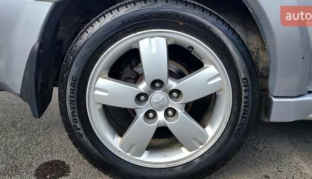 Серый Мицубиси Аутлендер, объемом двигателя 2.38 л и пробегом 323 тыс. км за 6800 $, фото 24 на Automoto.ua