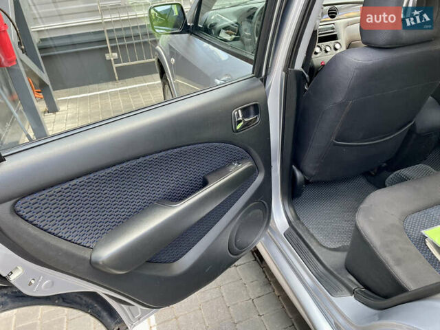 Сірий Міцубісі Аутлендер, об'ємом двигуна 2 л та пробігом 130 тис. км за 8500 $, фото 15 на Automoto.ua