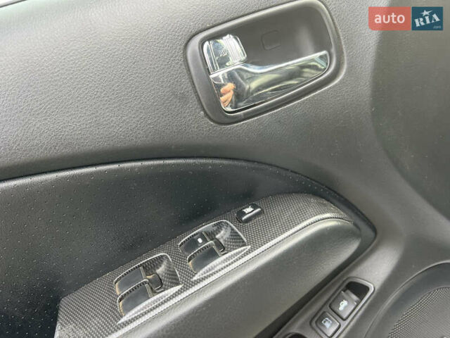 Серый Мицубиси Аутлендер, объемом двигателя 2.38 л и пробегом 197 тыс. км за 7699 $, фото 6 на Automoto.ua