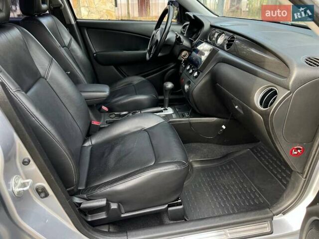 Серый Мицубиси Аутлендер, объемом двигателя 2.38 л и пробегом 170 тыс. км за 6900 $, фото 16 на Automoto.ua