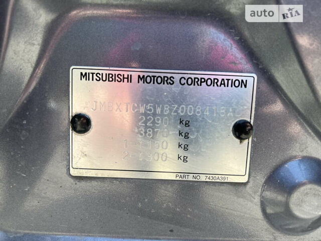 Серый Мицубиси Аутлендер, объемом двигателя 2.4 л и пробегом 125 тыс. км за 9500 $, фото 5 на Automoto.ua
