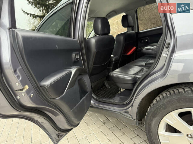 Сірий Міцубісі Аутлендер, об'ємом двигуна 2 л та пробігом 237 тис. км за 8999 $, фото 36 на Automoto.ua