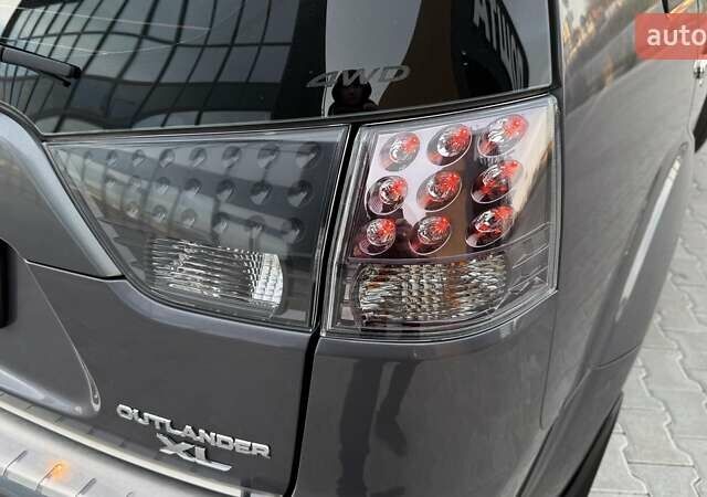 Серый Мицубиси Аутлендер, объемом двигателя 2.4 л и пробегом 174 тыс. км за 9599 $, фото 21 на Automoto.ua