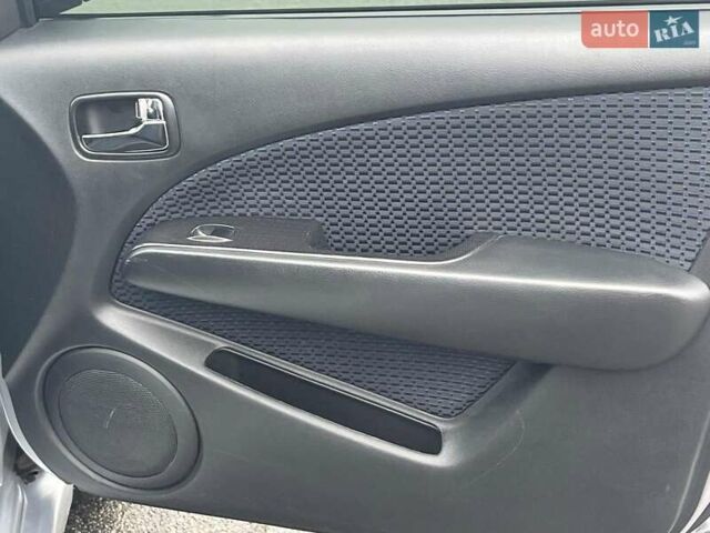 Серый Мицубиси Аутлендер, объемом двигателя 2.4 л и пробегом 324 тыс. км за 6890 $, фото 15 на Automoto.ua