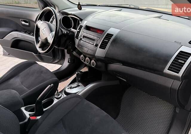 Серый Мицубиси Аутлендер, объемом двигателя 2.4 л и пробегом 174 тыс. км за 9599 $, фото 24 на Automoto.ua