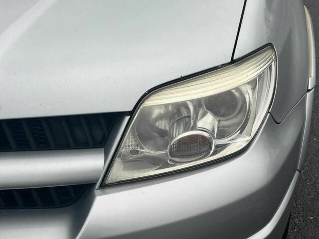 Сірий Міцубісі Аутлендер, об'ємом двигуна 2.4 л та пробігом 324 тис. км за 6890 $, фото 4 на Automoto.ua