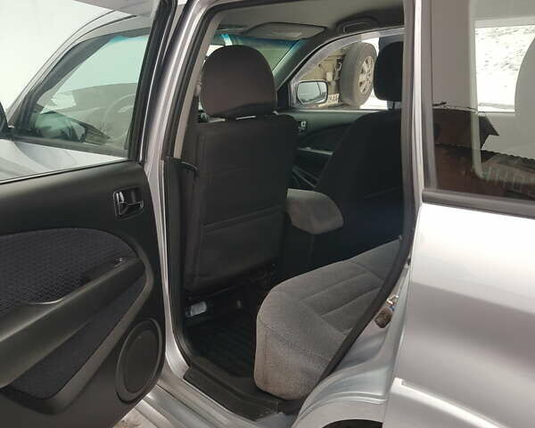 Серый Мицубиси Аутлендер, объемом двигателя 2.38 л и пробегом 700 тыс. км за 7058 $, фото 10 на Automoto.ua