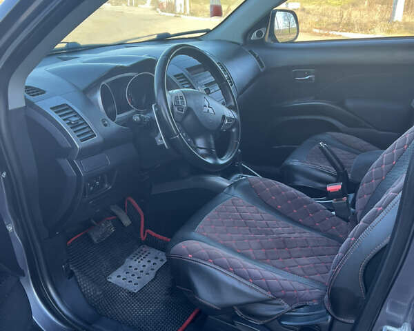 Сірий Міцубісі Аутлендер, об'ємом двигуна 2.36 л та пробігом 214 тис. км за 7800 $, фото 10 на Automoto.ua