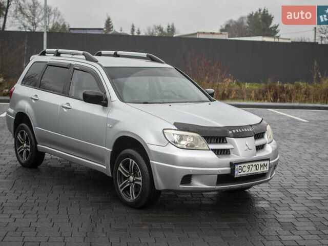 Сірий Міцубісі Аутлендер, об'ємом двигуна 2 л та пробігом 258 тис. км за 5650 $, фото 14 на Automoto.ua