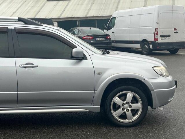 Сірий Міцубісі Аутлендер, об'ємом двигуна 2.4 л та пробігом 324 тис. км за 6890 $, фото 13 на Automoto.ua