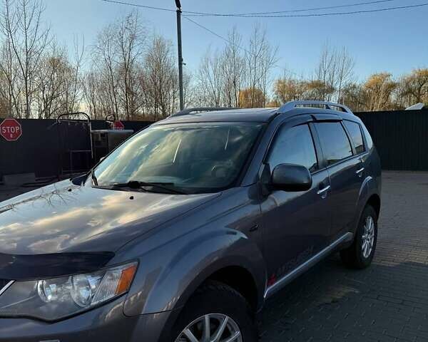 Серый Мицубиси Аутлендер, объемом двигателя 2.18 л и пробегом 287 тыс. км за 10200 $, фото 1 на Automoto.ua