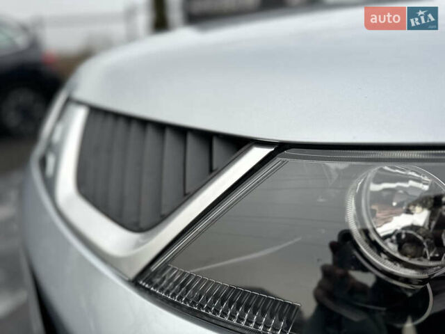 Серый Мицубиси Аутлендер, объемом двигателя 2.4 л и пробегом 61 тыс. км за 11300 $, фото 20 на Automoto.ua