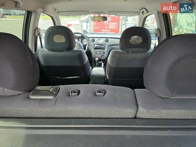 Серый Мицубиси Аутлендер, объемом двигателя 2 л и пробегом 151 тыс. км за 7500 $, фото 9 на Automoto.ua