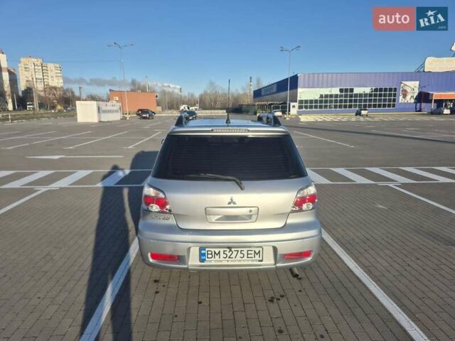 Сірий Міцубісі Аутлендер, об'ємом двигуна 2 л та пробігом 247 тис. км за 5600 $, фото 1 на Automoto.ua