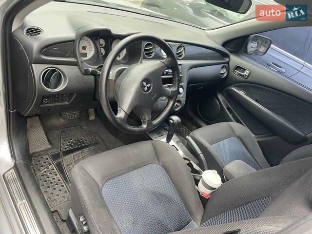 Сірий Міцубісі Аутлендер, об'ємом двигуна 2.38 л та пробігом 209 тис. км за 7460 $, фото 4 на Automoto.ua