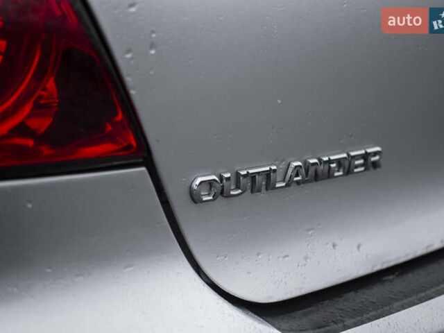 Сірий Міцубісі Аутлендер, об'ємом двигуна 2 л та пробігом 258 тис. км за 5650 $, фото 10 на Automoto.ua