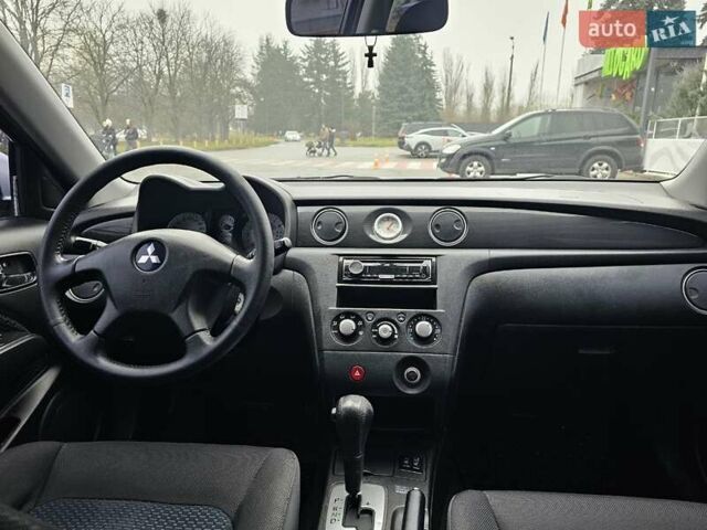 Сірий Міцубісі Аутлендер, об'ємом двигуна 2.38 л та пробігом 230 тис. км за 5700 $, фото 18 на Automoto.ua