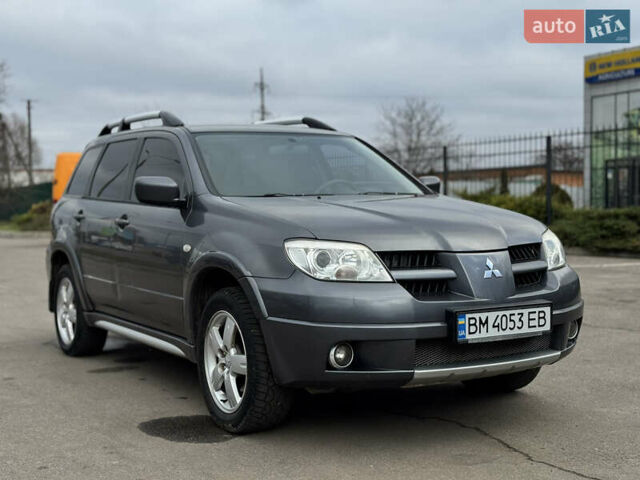 Серый Мицубиси Аутлендер, объемом двигателя 2.38 л и пробегом 254 тыс. км за 7300 $, фото 6 на Automoto.ua