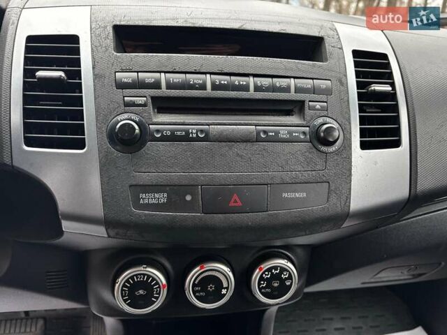 Серый Мицубиси Аутлендер, объемом двигателя 2.4 л и пробегом 237 тыс. км за 8490 $, фото 20 на Automoto.ua
