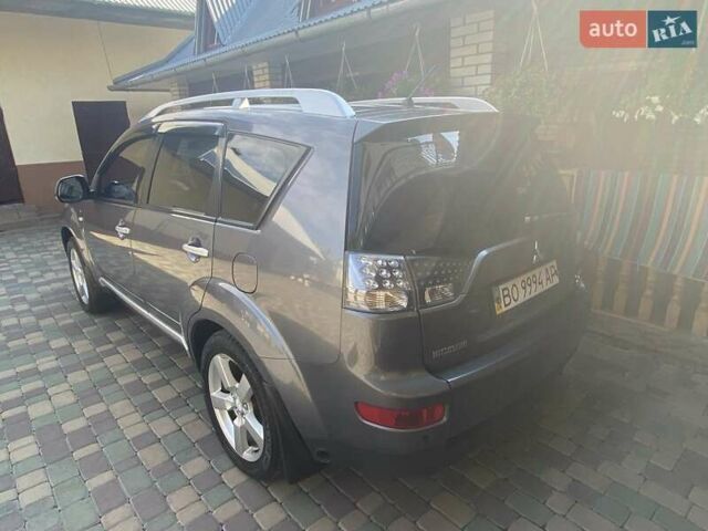 Серый Мицубиси Аутлендер, объемом двигателя 3 л и пробегом 232 тыс. км за 9200 $, фото 2 на Automoto.ua
