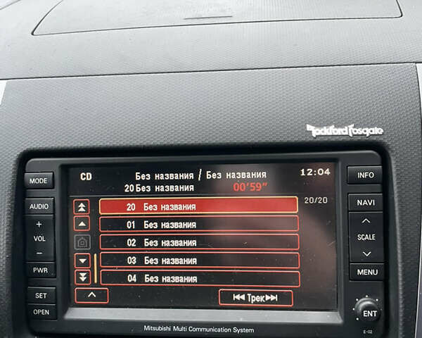 Серый Мицубиси Аутлендер, объемом двигателя 2.01 л и пробегом 345 тыс. км за 8100 $, фото 12 на Automoto.ua