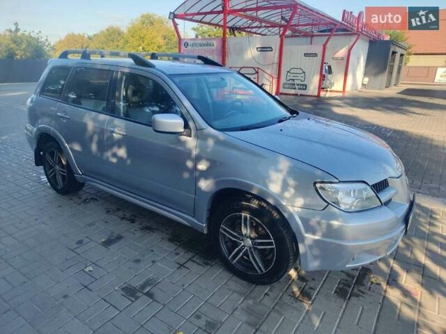 Сірий Міцубісі Аутлендер, об'ємом двигуна 2.38 л та пробігом 180 тис. км за 5700 $, фото 3 на Automoto.ua