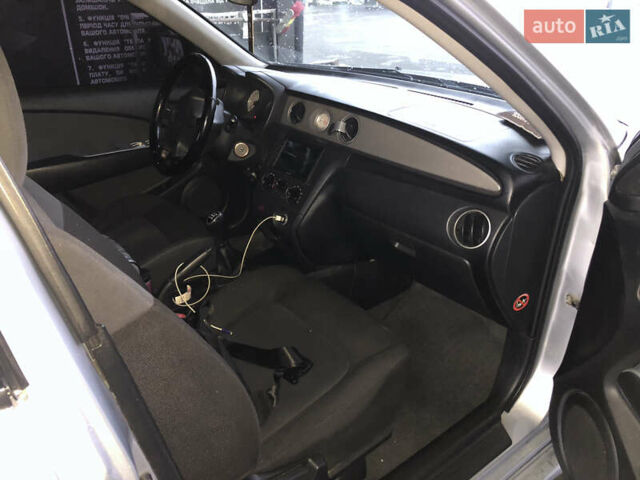 Серый Мицубиси Аутлендер, объемом двигателя 2 л и пробегом 170 тыс. км за 6950 $, фото 6 на Automoto.ua