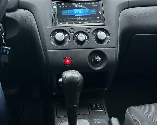 Серый Мицубиси Аутлендер, объемом двигателя 2.38 л и пробегом 81 тыс. км за 8700 $, фото 9 на Automoto.ua