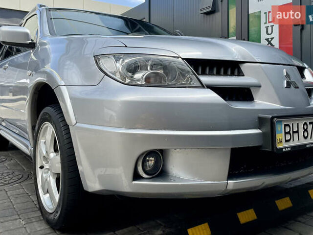 Сірий Міцубісі Аутлендер, об'ємом двигуна 2 л та пробігом 130 тис. км за 8500 $, фото 1 на Automoto.ua
