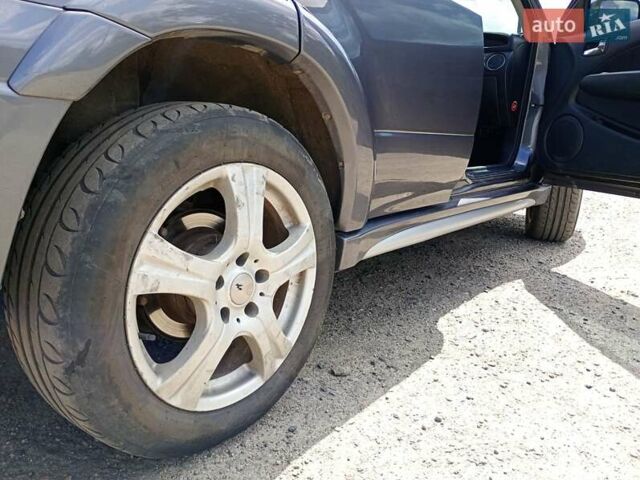 Серый Мицубиси Аутлендер, объемом двигателя 2.35 л и пробегом 342 тыс. км за 6900 $, фото 15 на Automoto.ua
