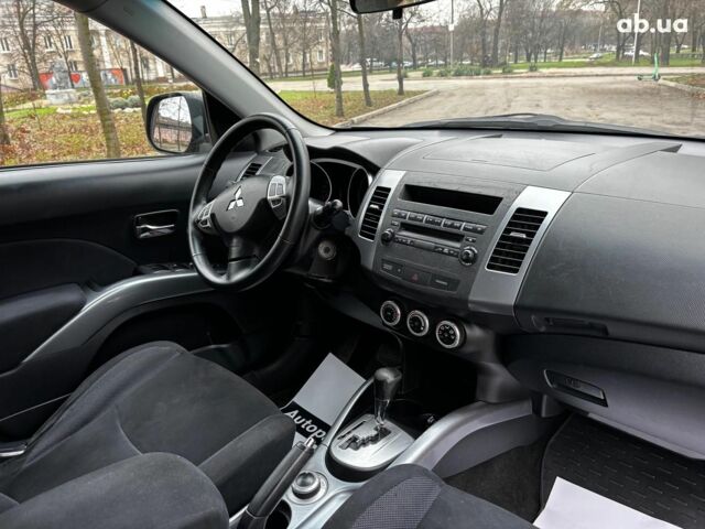 Серый Мицубиси Аутлендер, объемом двигателя 2.4 л и пробегом 237 тыс. км за 8490 $, фото 17 на Automoto.ua