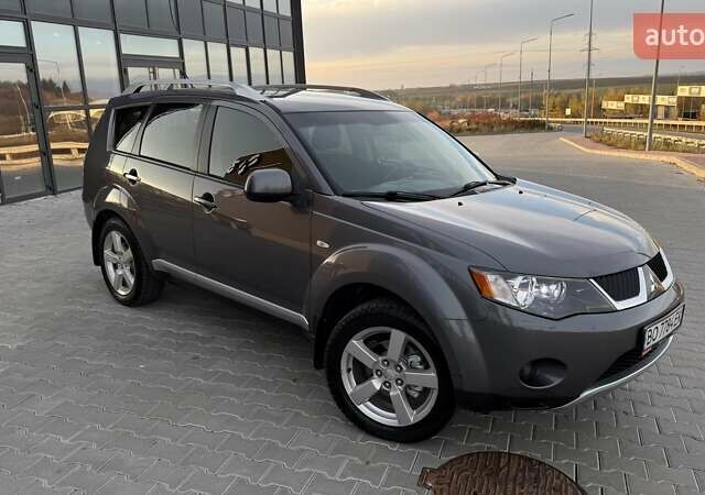 Серый Мицубиси Аутлендер, объемом двигателя 2.4 л и пробегом 174 тыс. км за 9599 $, фото 10 на Automoto.ua