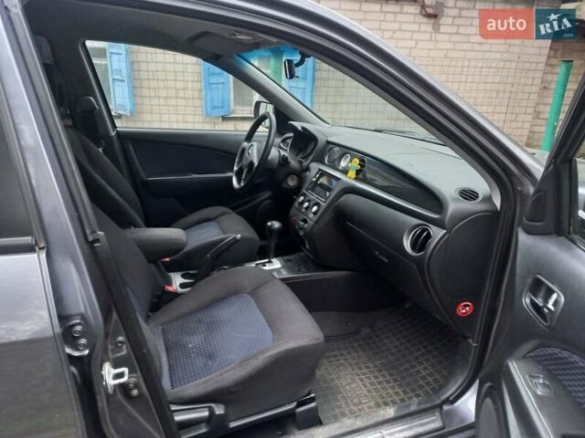 Серый Мицубиси Аутлендер, объемом двигателя 2.38 л и пробегом 143 тыс. км за 7300 $, фото 19 на Automoto.ua