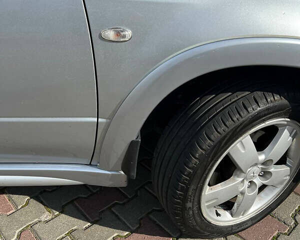 Сірий Міцубісі Аутлендер, об'ємом двигуна 2 л та пробігом 214 тис. км за 6900 $, фото 6 на Automoto.ua