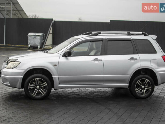 Сірий Міцубісі Аутлендер, об'ємом двигуна 2 л та пробігом 258 тис. км за 5650 $, фото 5 на Automoto.ua